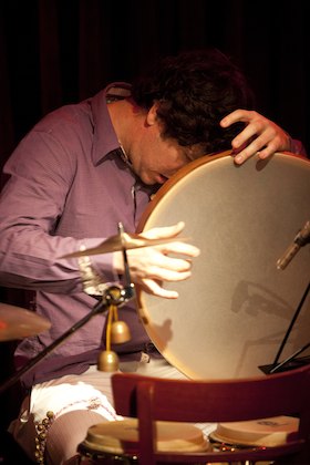 Mr. Ho plays lap-style bodhran on Phoenix Goodbye